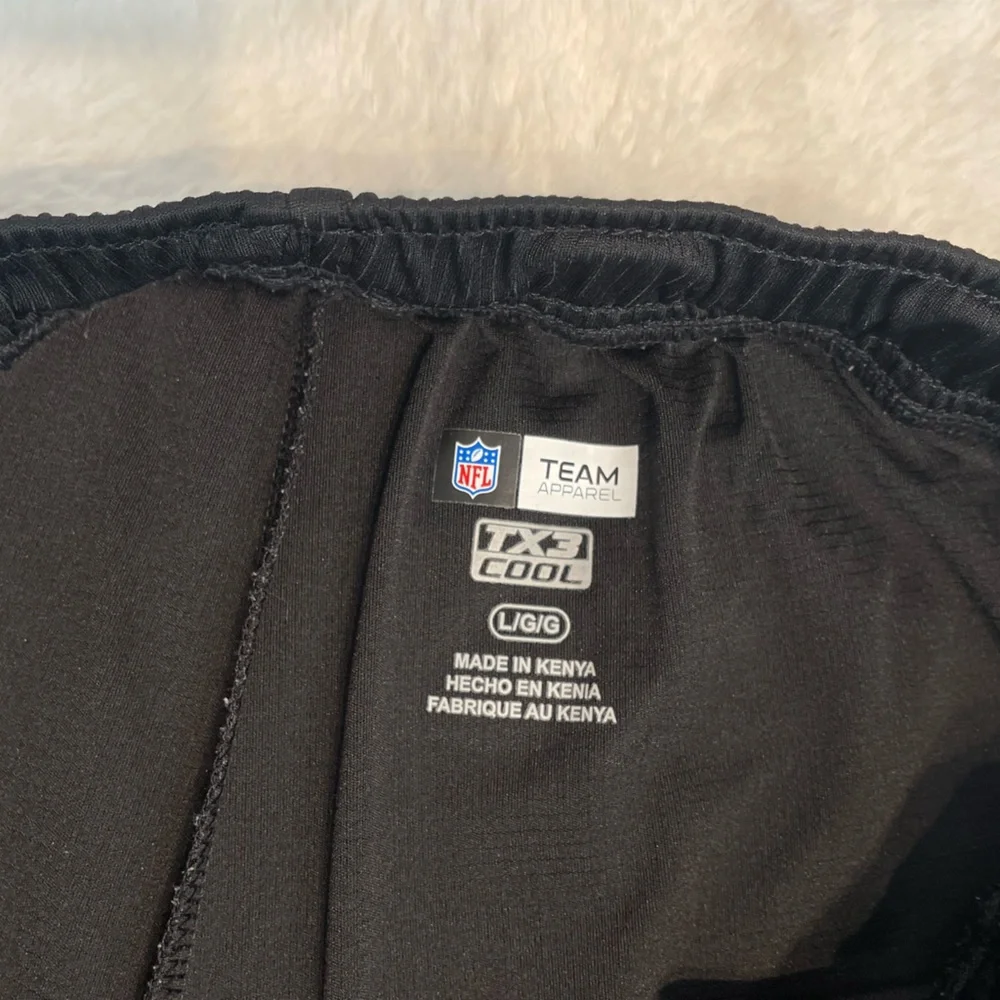 NFL team apparel New Orleans Saints size large black & gray
